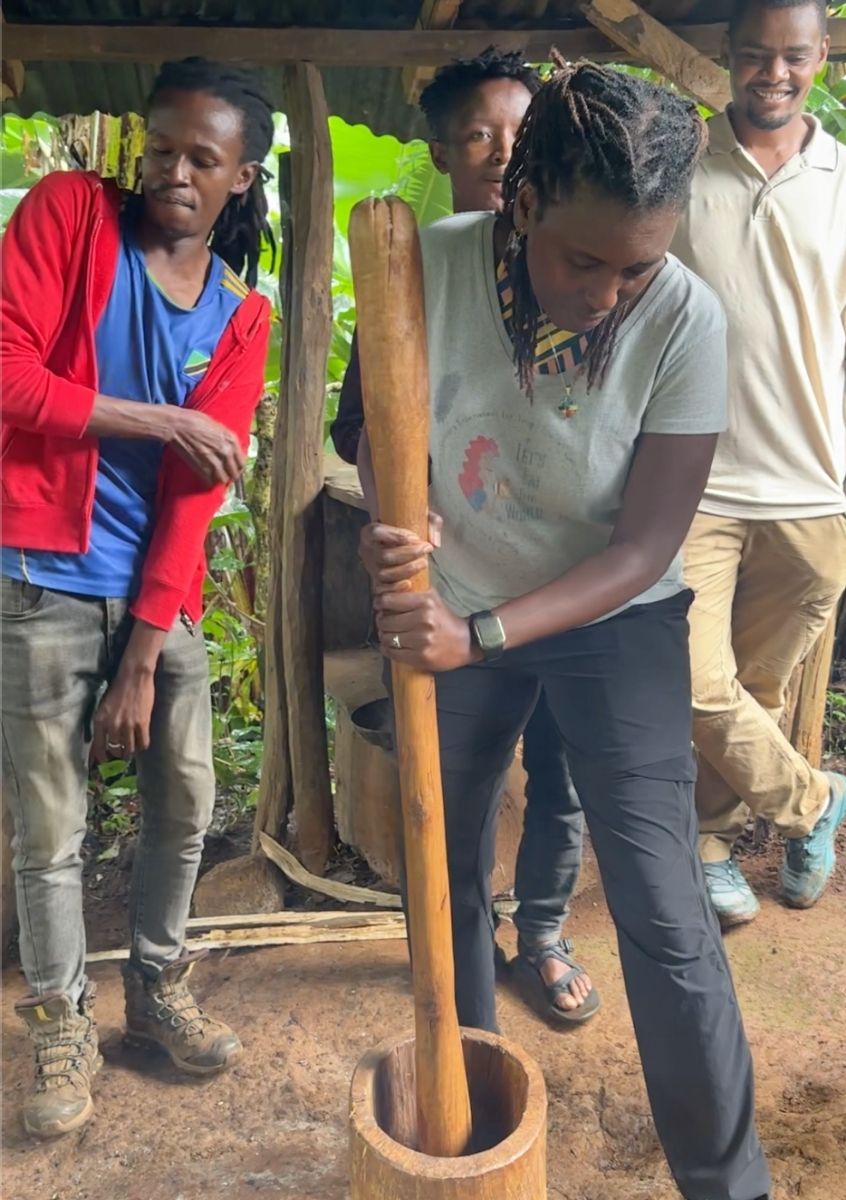 Grinding coffee to the songs of the Chaaga men