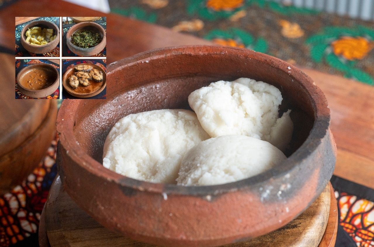 A traditional Tanzanian spread: ugali served with greens, banana stew, beans, and local fish.