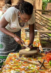 Learning traditional Chaaga cooking techniques in Moshi, Tanzania